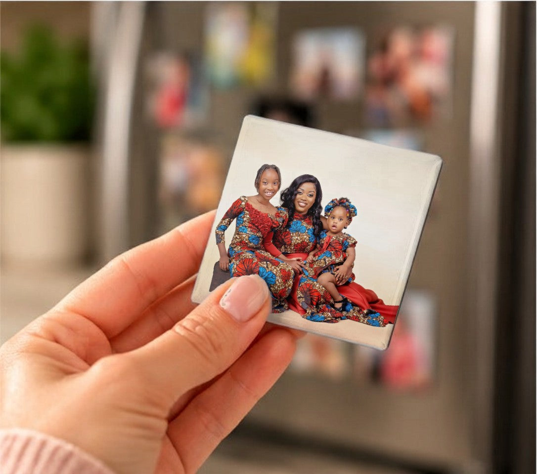 Family Photo Magnets held in a hand